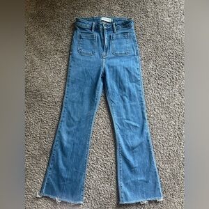 High-Rise Blue Flare Jeans with Front Patch Pockets